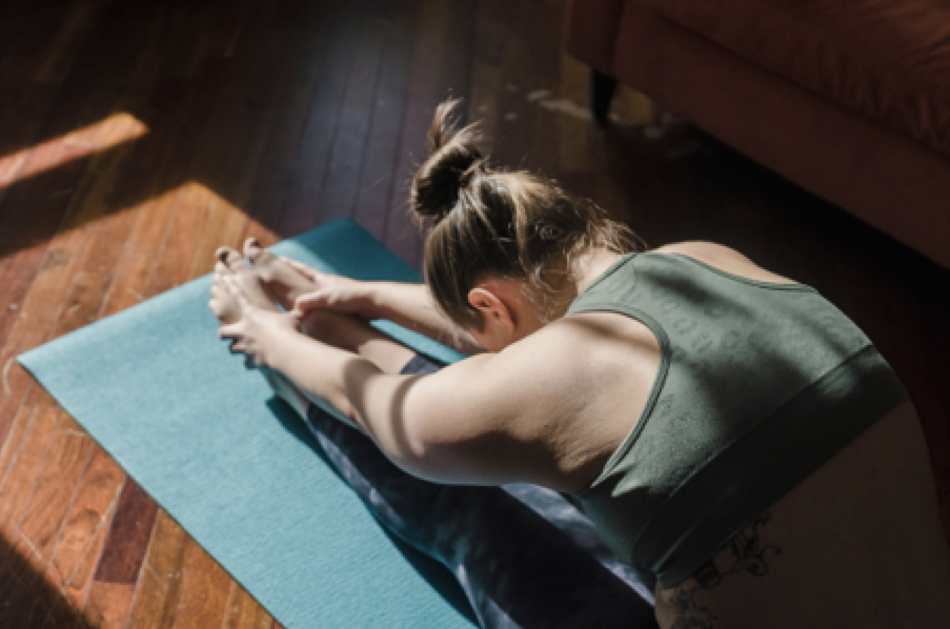 Yoga practitioner with mat